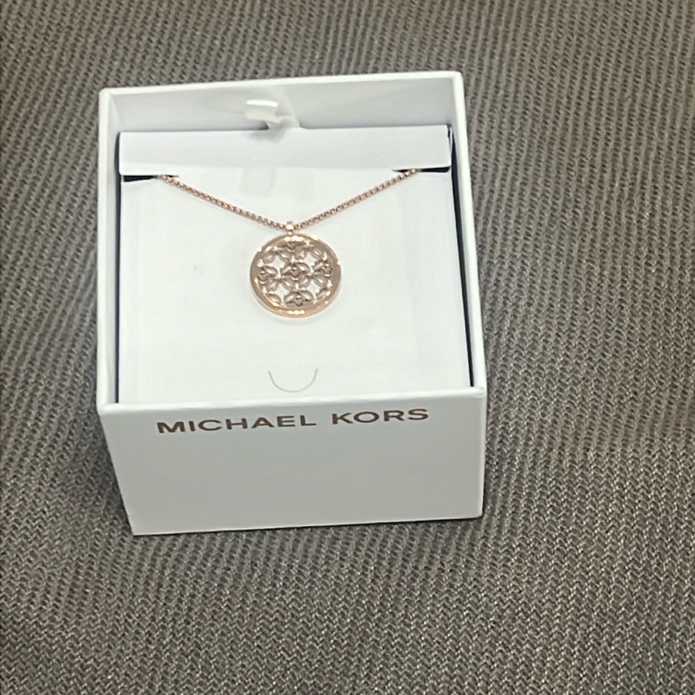 Micheal Kors rose gold pendant with necklace